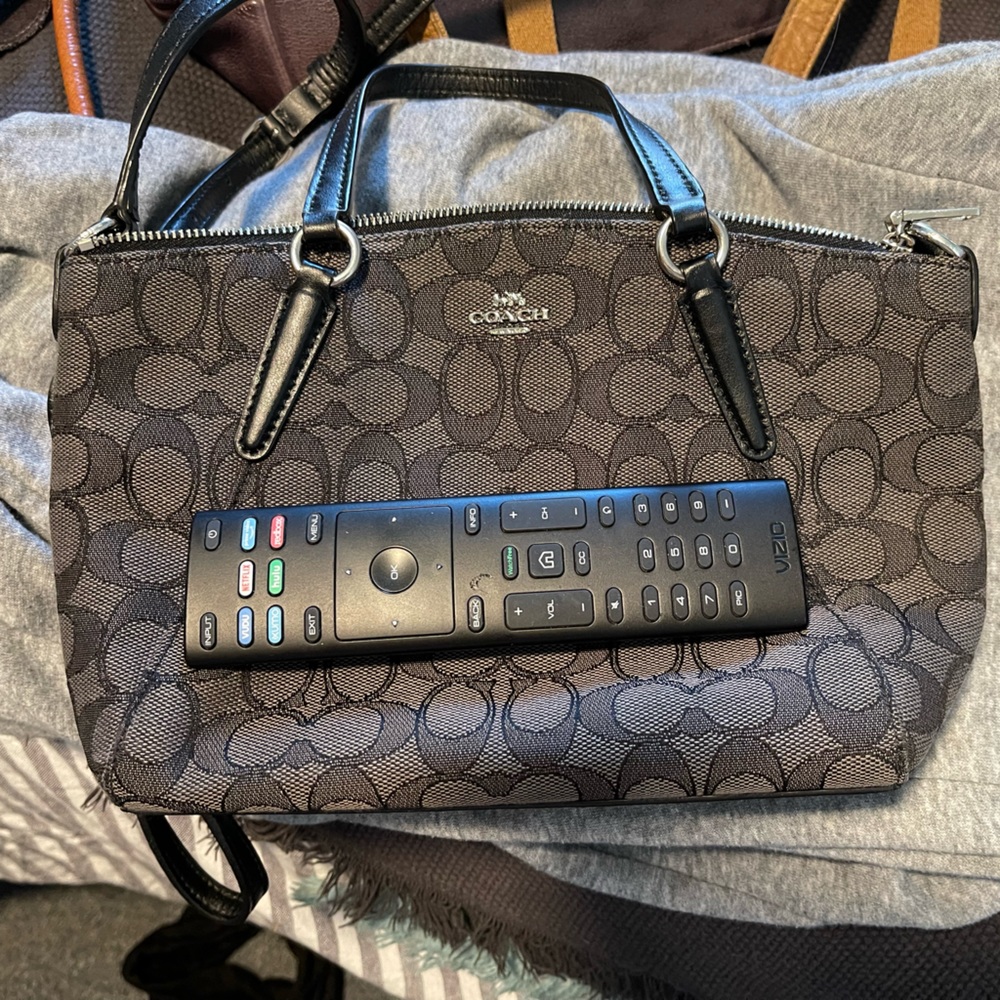 Coach small crossbody, remote to show size comparison